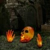 8.5" Lighted Orange Skull and Hands Outdoor Halloween Decoration - 4ft Black Wire