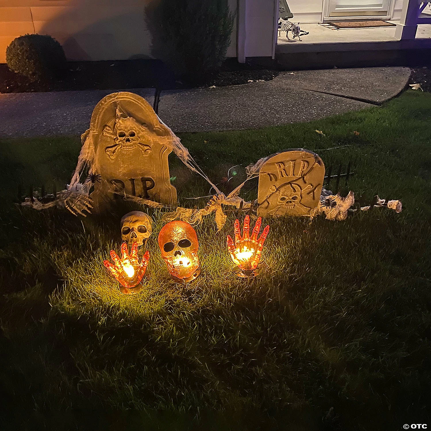 8.5" Lighted Orange Skull and Hands Outdoor Halloween Decoration - 4ft Black Wire - Image 2